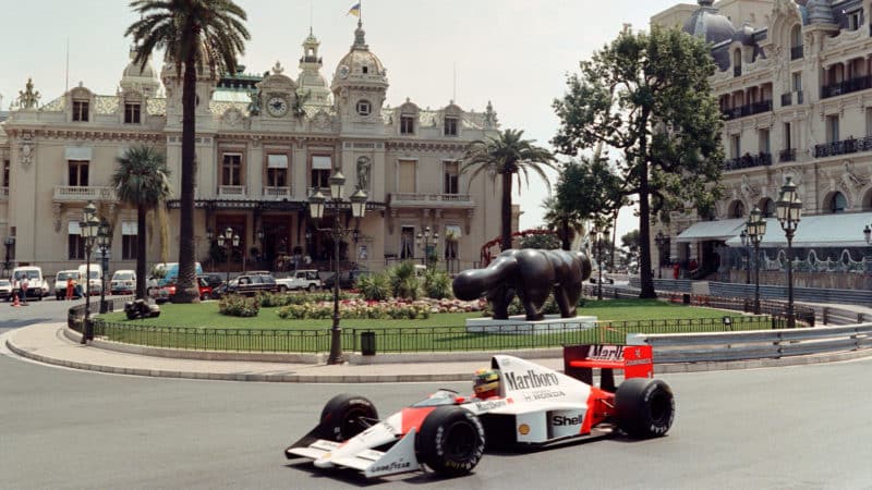 Brazilian Ayrton Senna on board his McLaren drives past the Casino of Monte-Carlo on May 4, 1989 during the time trials. - The 47th Formula One Grand Prix of Monaco will be run on May 7. (Photo by AFP) (Photo credit should read DOMINIQUE FAGET,MICHEL GANGNE,GERARD JULIEN,PASCAL PAVANI/AFP via Getty Images)