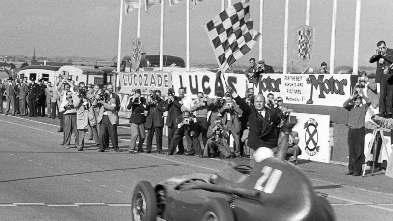 Stirling Moss wins the 1957 British GRand Prix in a Vanwall shared with Tony Brookspsd