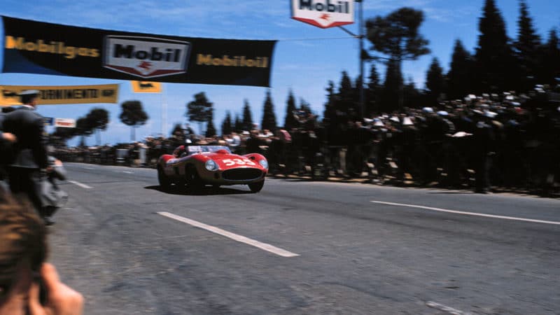 Piero Taruffi, the eventual race winner, accelerates away from the Rome Control in his Ferrari 315 Sport during the Mille Miglia, May 1957. (Photo by Klemantaski Collection/Getty Images)