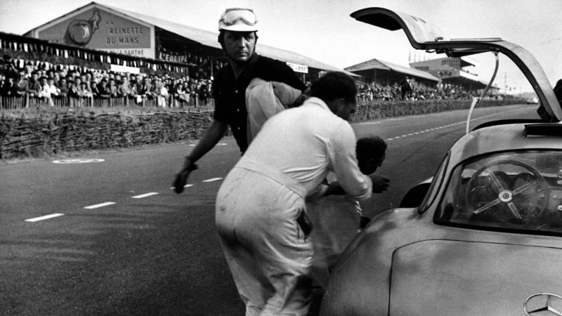 Theo Helfrich gets out of a Mercedes 300 SL at the 1952 Le Mans 24 Hours