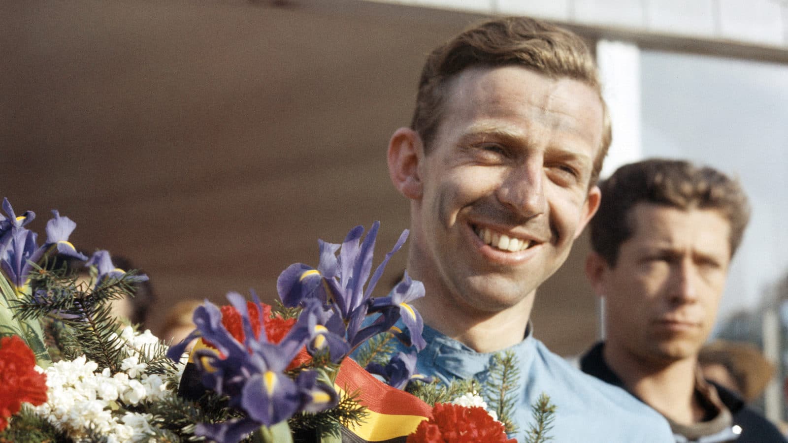 Tony Brooks celebrates victory in the 1958 Belgian Grand Prix