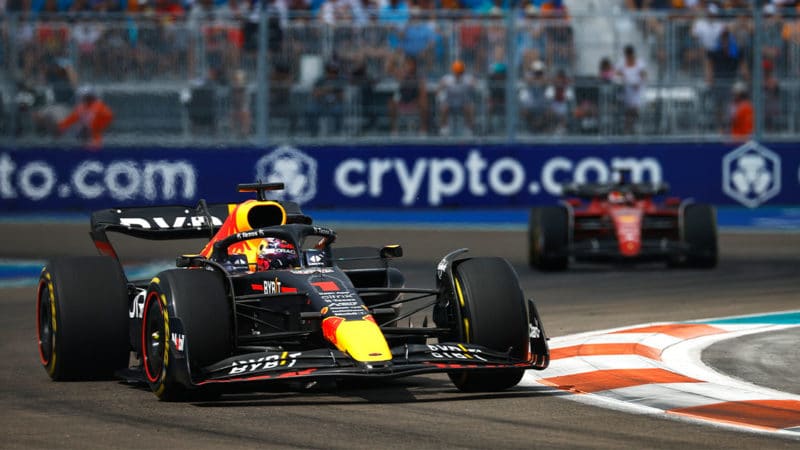 MIAMI, FLORIDA - MAY 08: Max Verstappen of the Netherlands driving the (1) Oracle Red Bull Racing RB18 leads Charles Leclerc of Monaco driving (16) the Ferrari F1-75 during the F1 Grand Prix of Miami at the Miami International Autodrome on May 08, 2022 in Miami, Florida. (Photo by Jared C. Tilton/Getty Images)