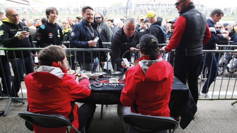 Valentino Rossi signs autographs at Brands Hatch