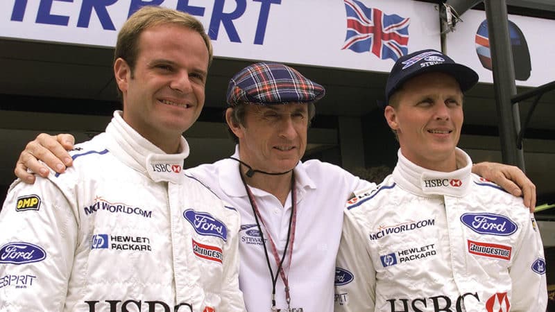 Jackie poses with Rubens Barrichello and Johnny Herbert