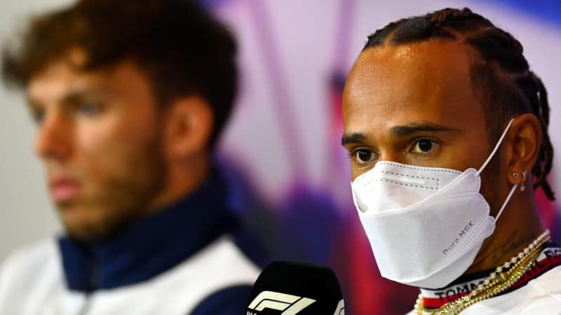 NORTHAMPTON, ENGLAND - JUNE 30: Lewis Hamilton of Great Britain and Mercedes talks in the Drivers Press Conference during previews ahead of the F1 Grand Prix of Great Britain at Silverstone on June 30, 2022 in Northampton, England. (Photo by Dan Mullan/Getty Images)