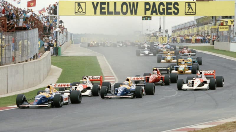 Nigel Mansell, driver of the #5 Canon Williams Renault Williams FW14B Renault 3.5 V10 leads the field at the start of the Yellow Pages South African Grand Prix on 1st March 1992 at the Kyalami Grand Prix Circuit in Kyalami, South Africa.(Photo by Pascal Rondeau/Getty Images)