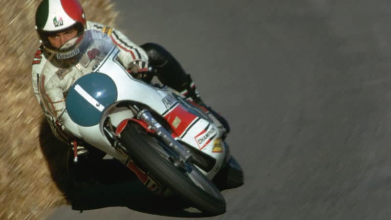 Motorcycle Racer Giacomo Agostini in Action (Photo by Jean-Yves Ruszniewski/TempSport/Corbis/VCG via Getty Images)