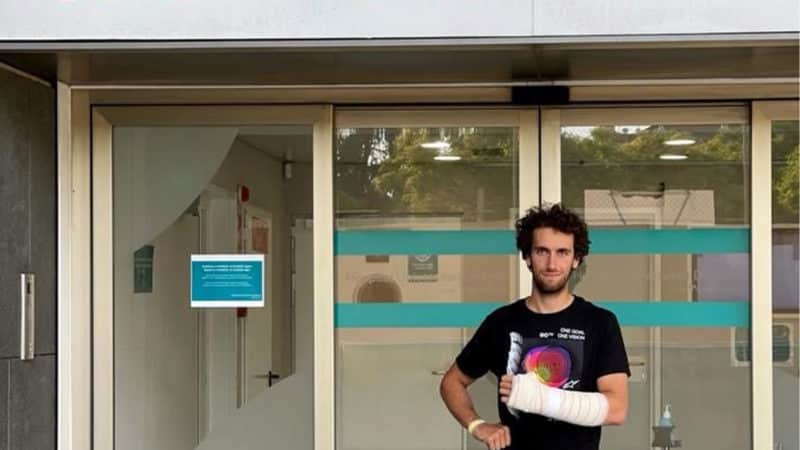 Alex RIns Suzuki MotoGP rider outside hospital with a bandaged broken wrist