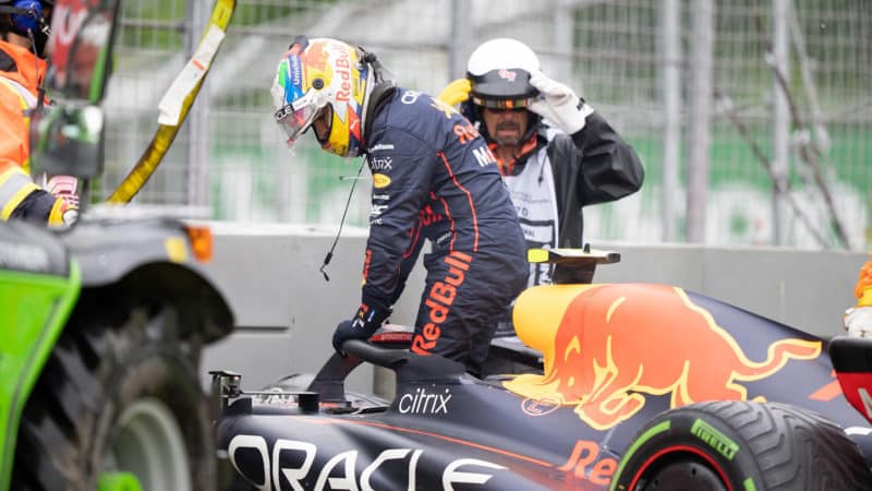 Sergio Perez climbs out ofnhis Red Bull after crashing out of 2022 Canadian GP qualifying