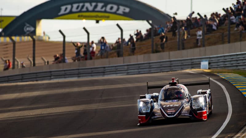 United Autosports car with Dunlop Bridge in the background