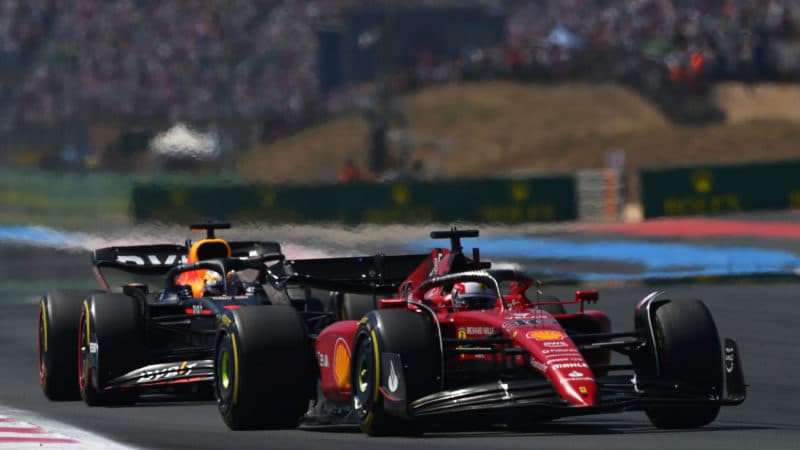 LE CASTELLET, FRANCE - JULY 24: Charles Leclerc of Monaco driving the (16) Ferrari F1-75 leads Max Verstappen of the Netherlands driving the (1) Oracle Red Bull Racing RB18 during the F1 Grand Prix of France at Circuit Paul Ricard on July 24, 2022 in Le Castellet, France. (Photo by Dan Mullan/Getty Images)