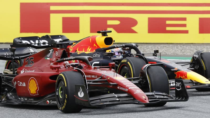Charles Leclerc passes Max Verstappen in the 2022 Austrian GP