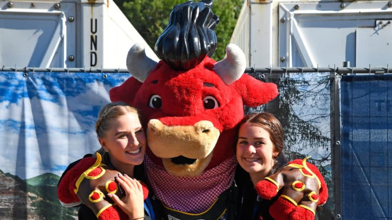 Mascot with two fans at 2022 Austrian GP