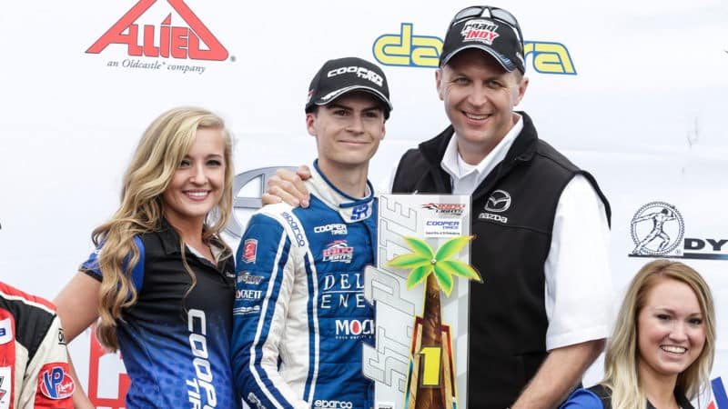 ST. PETERSBURG, FL - MARCH 12: Colton Herta, driver of the #98 Deltro Energy Andretti-Steinbrenner Racing Mazda, poses with the trophy following Race 2 of the Indy Lights Series Mazda Grand Prix of St. Petersburg Presented by Copper Tires on March 12, 2017, in St. Petersburg, Fl. (Photo by David Rosenblum/Icon Sportswire via Getty Images)