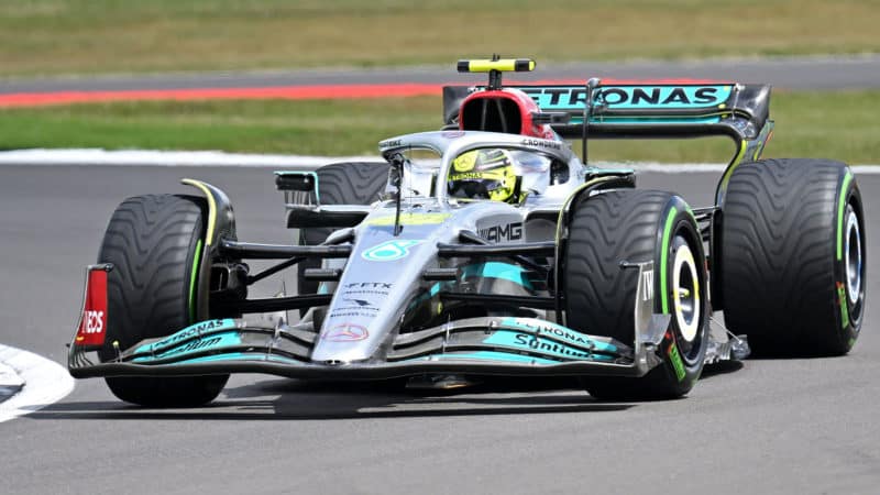 Mercedes' British driver Lewis Hamilton drives at Vale during first practice ahead of the Formula One British Grand Prix at the Silverstone motor racing circuit in Silverstone, central England on July 1, 2022. (Photo by JUSTIN TALLIS / AFP) (Photo by JUSTIN TALLIS/AFP via Getty Images)