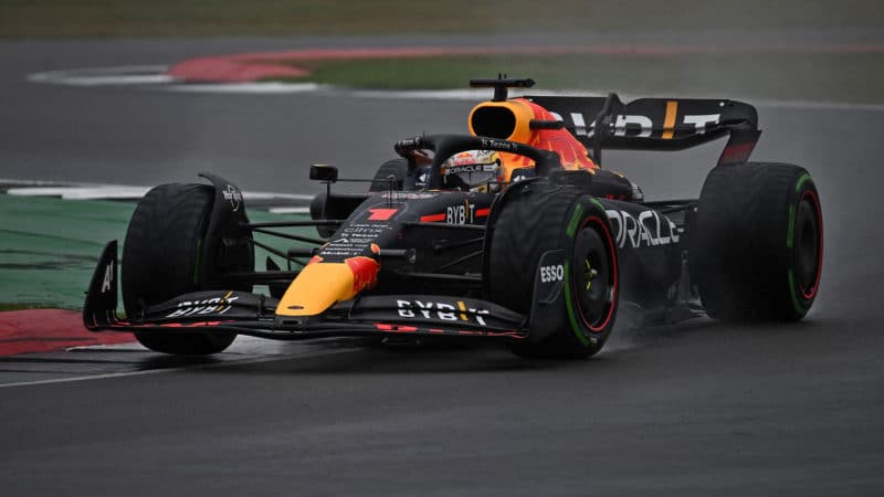 Red Bull Racing's Dutch driver Max Verstappen drives in rain during the second qualifying session for the Formula One British Grand Prix at the Silverstone motor racing circuit in Silverstone, central England on July 2, 2022. (Photo by Ben Stansall / AFP) (Photo by BEN STANSALL/AFP via Getty Images)