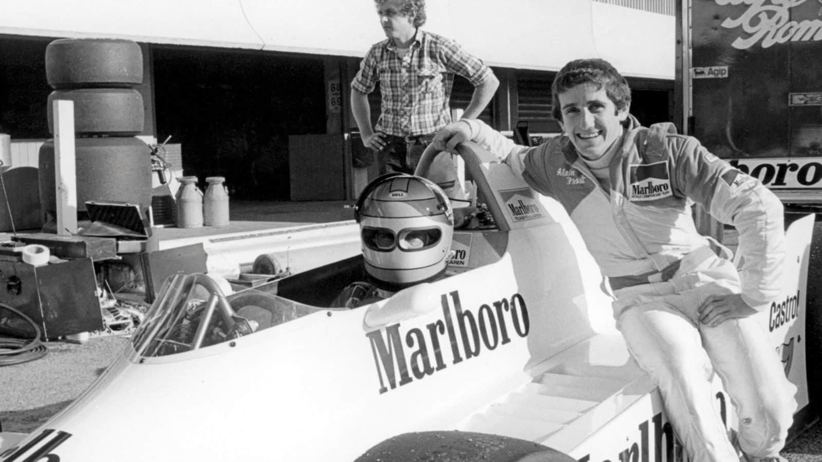 Alain Prost sits on the McLaren of John Watson in 1980