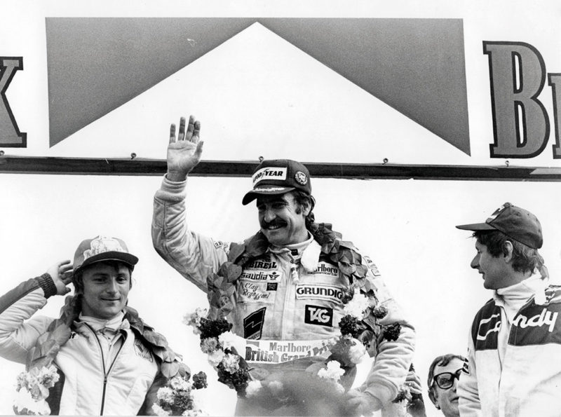 Clay Regazzoni on the podium at the 1979 British GP