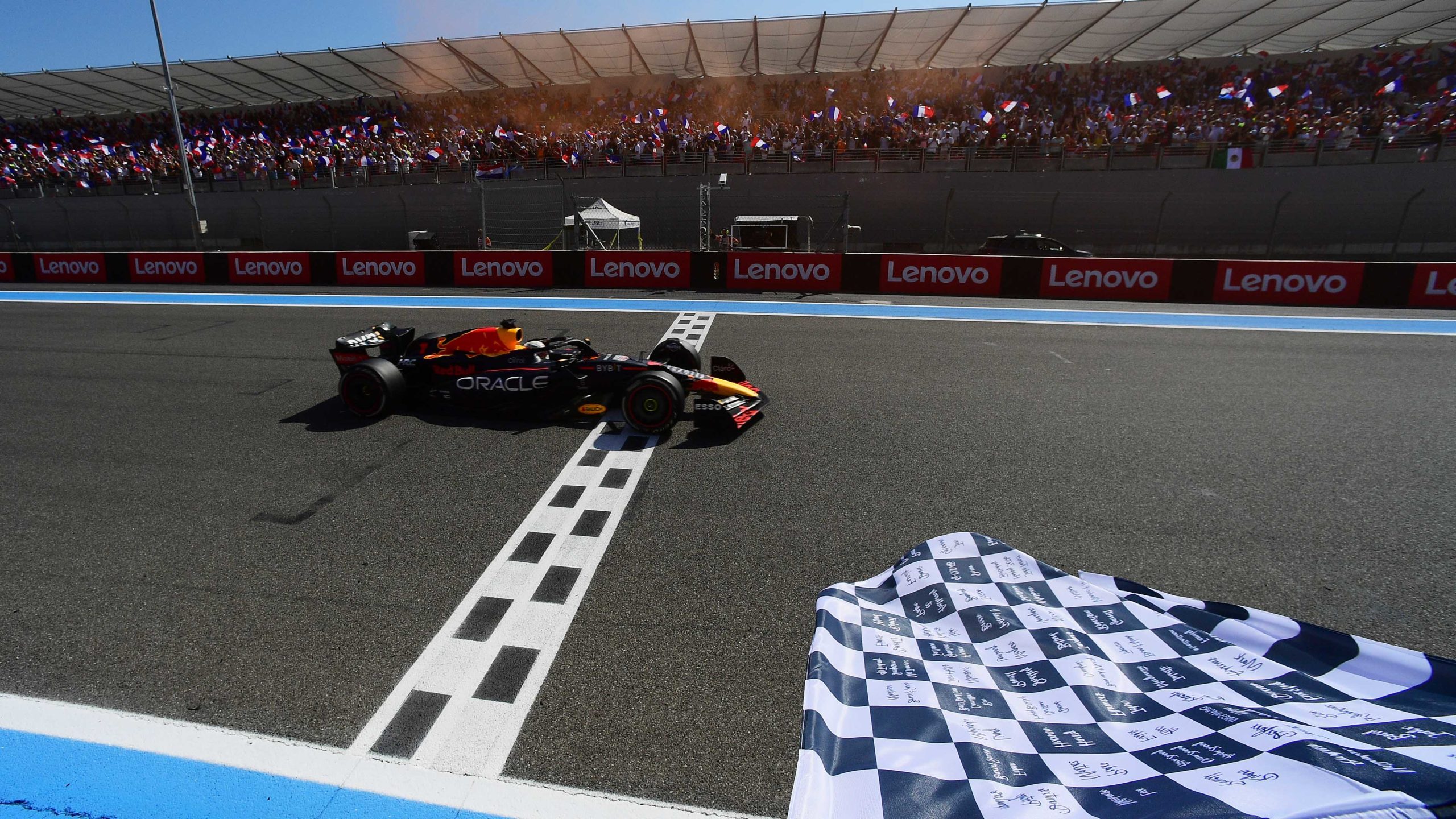 Chequered-flag-waves-as-Max-Verstappen-crosses-the-finish-line-to-win-the-2022-French-Grand-Prix