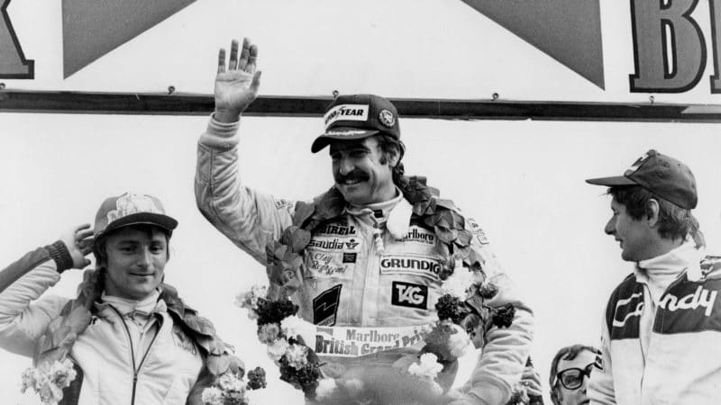 Clay-Regazzoni-on-the-podum-at-the-1979-British-GP