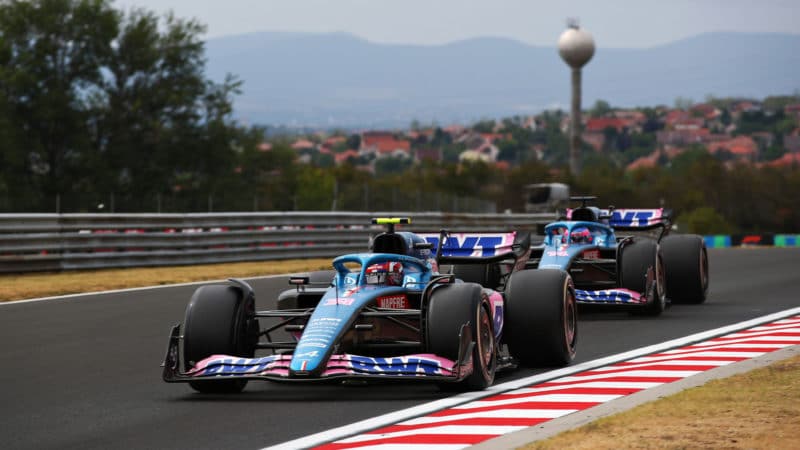 Esteban Ocon leads Fernando Alonso in the 2022 Hungarian Grand Prix