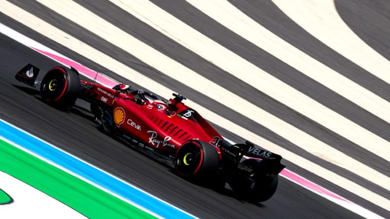 Ferrari of Charles Leclerc surrounded by the stripes of Paul Ricard at the 2022 French Grand Prix