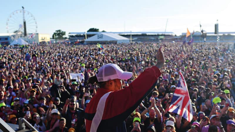 Lewis Hamilton waves to the Silverstone crowd at the 2022 British GP