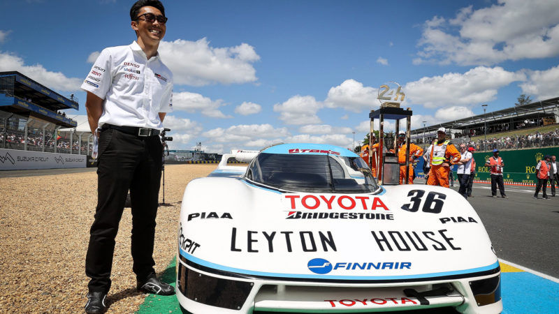 Kazukia-Nakajima-with-his-father's-Toyota-85C-Group-C-car-at-the-Le-Mans-Classic-2022-pose