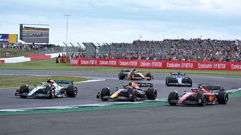 Lewis Hamilton Sergio Perez and Charles Leclerc battling at Silvewrstone in the 2022 British Grand Prix