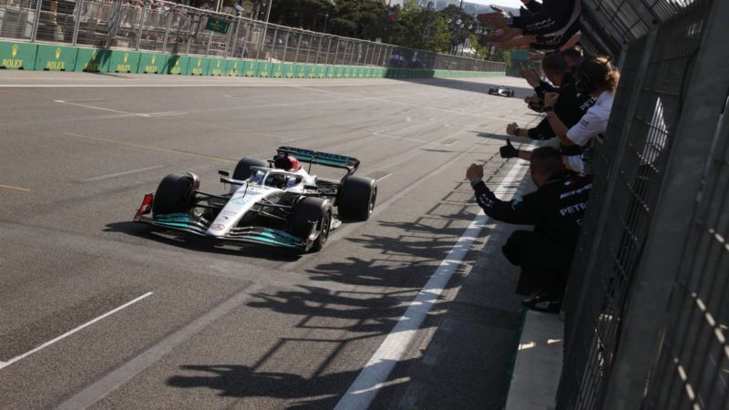 Mercedes team cheers George Russell as he crosses the finish line in the 2022 Azerbaijan GP