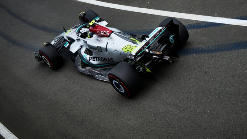 Mercedes of Lewis Hamilton leaves the Silverstone pitlane in British Grand Prix practice