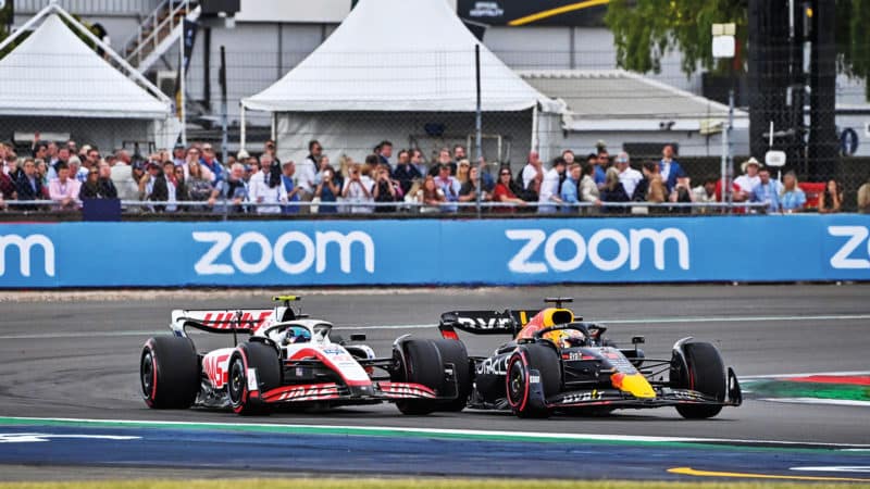 Mick Schumacher and Max Verstappen fighting at Silverstone in the 2022 British Grand Prix