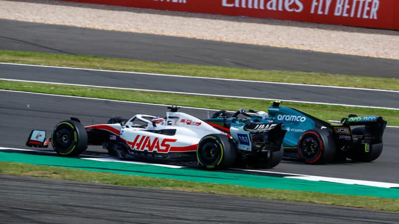 Mick Schumacher passes Sebastian Vettel in the 2022 British Grand Prix