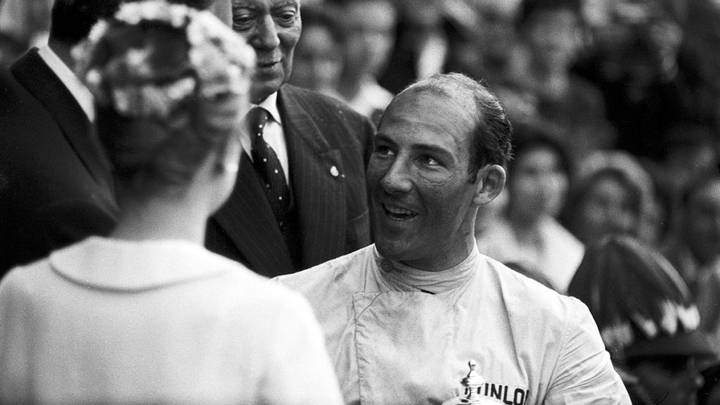 Prince Rainier and Princess Grace congratulate Stirling Moss