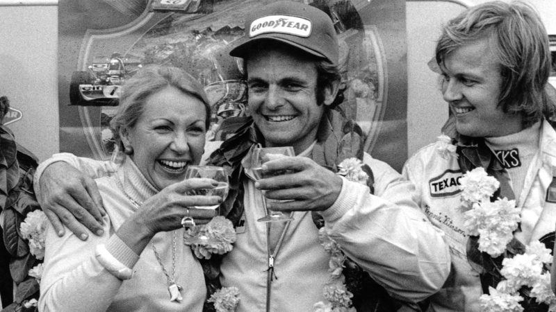 Peter Revson on the SIlverstone podium with Ronnie Peterson at the 1973 British Grand Prix