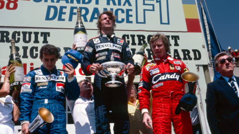 Rene Arnoux on the podium with Alain Prost and Didier Pironi after the 1982 French Grand Prix