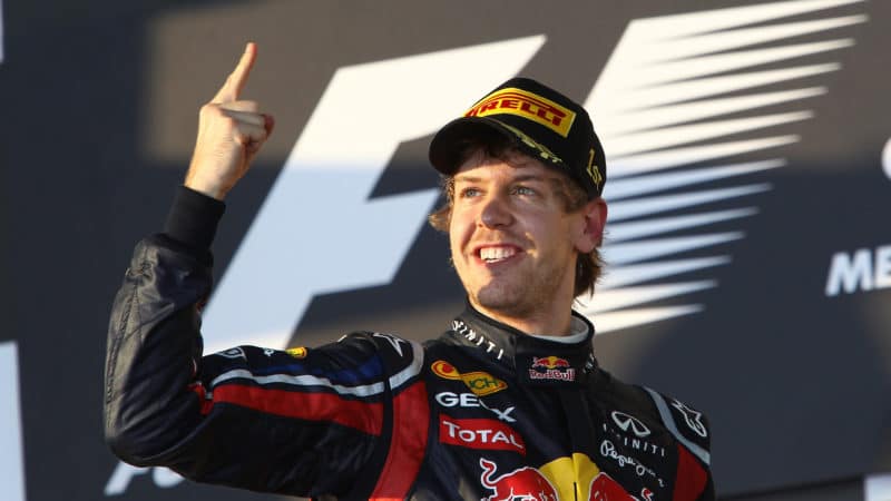 Sebastian Vettel raises his finger as he celebrates winning the 2010 Australian Grand Prix