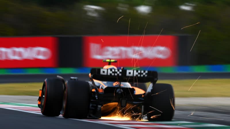 Sparks from the McLaren of Lando Norris in practice for the 2022 Hungarian Grand Prix