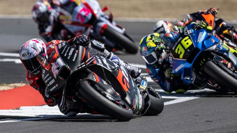 Aprilia MotoGP rider Aleix Espargaro battles at the 2022 British GP at Silverstone
