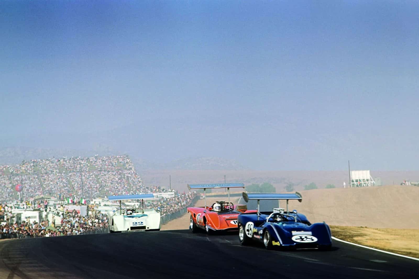 Dan-Gurney-Chuck-Parsons-and-Jackie-Oliver-at-1969-Riverside-Can-Am-race
