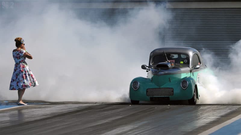 Everybody should give up smoking, except perhaps at Santa Pod- Willys driver Richard Warburton lights up