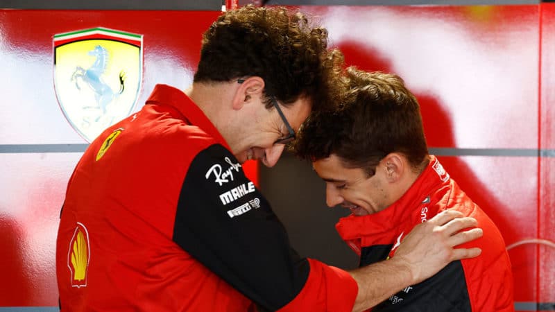 Ferrari team boss and driver Mattia Binotto and driver Charles Leclerc