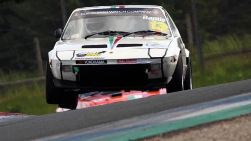 Fiat X1 9 racing car cornering on track