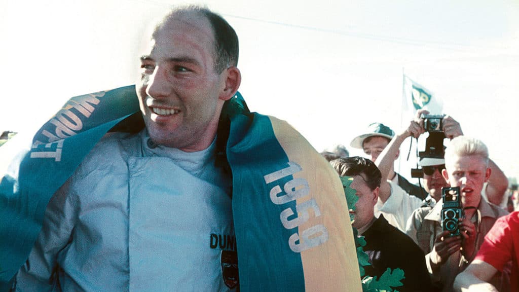 Moss celebrates after winning the 1959 Kanonloppet at Karlskoga