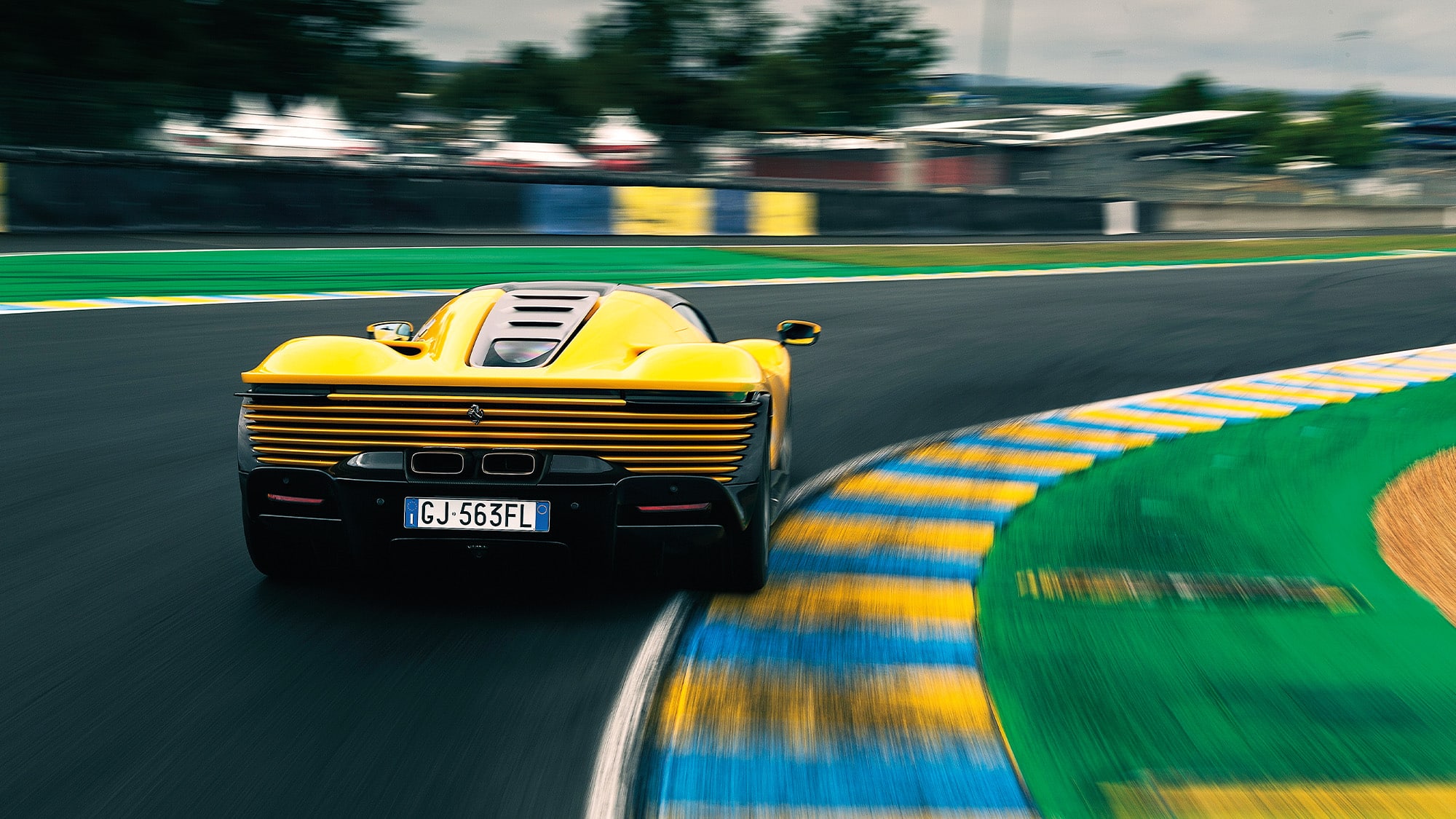 Rear view of Ferrari Daytona SP3 cornering at Le Mans