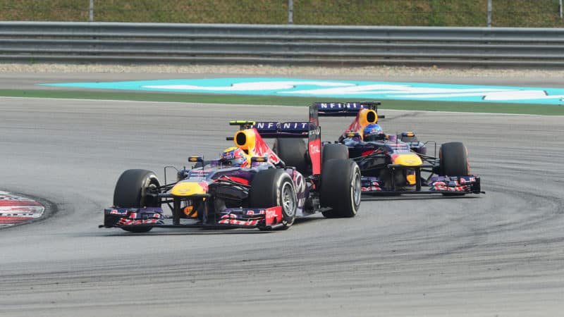 Red-Bull-drovers-Mark-Webber-and-Sebastian-Vettel-dicing-at-the-2013-Malaysian-GP