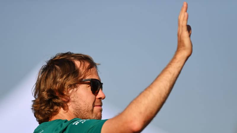 Sebastian Vettel waves to the crowd after announcing his F1 retirement