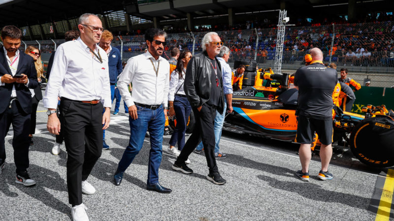 Stefano Domenicali with Mohammed Ben Sulayem and flavio Briatore at the Austrian Grand Prix in 2022