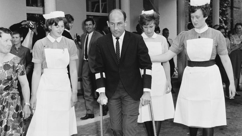 Stirling Moss leaves the Atkinson Morley Convalescent Hospital, Wimbledon, in June 1962