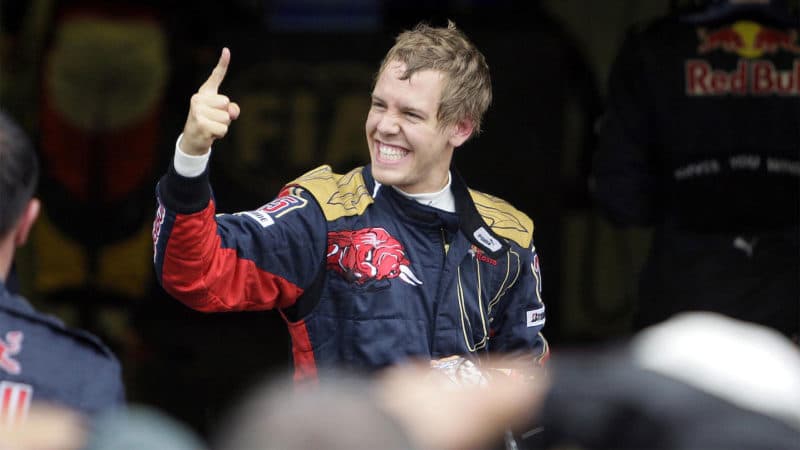 Toro-Rosso-driver-Sebastian-Vettel-celebrates-taking-pole-for-the-2008-Italian-GP